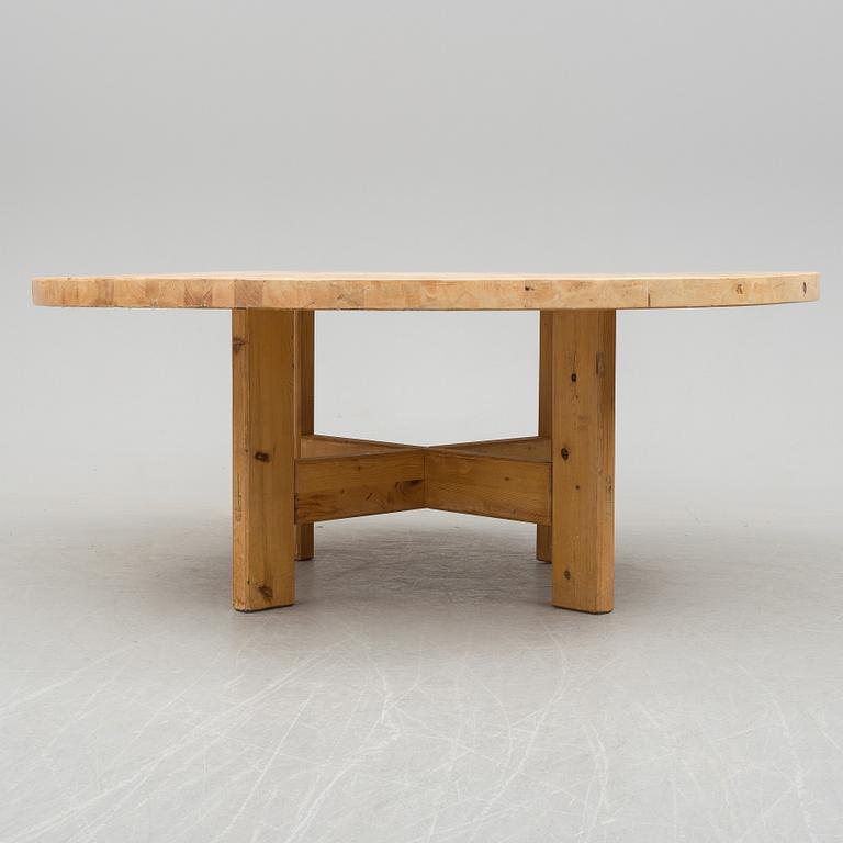 a pine wood dining table by Roland Wilhelsson, latter part of 20th century.