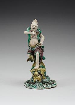 A famille verte figurine of a sea deamon, Qing dynasty, Kangxi (1662-1722).