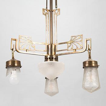 A Jugend style patinated bronze pendant ceiling light from the early 1900s.