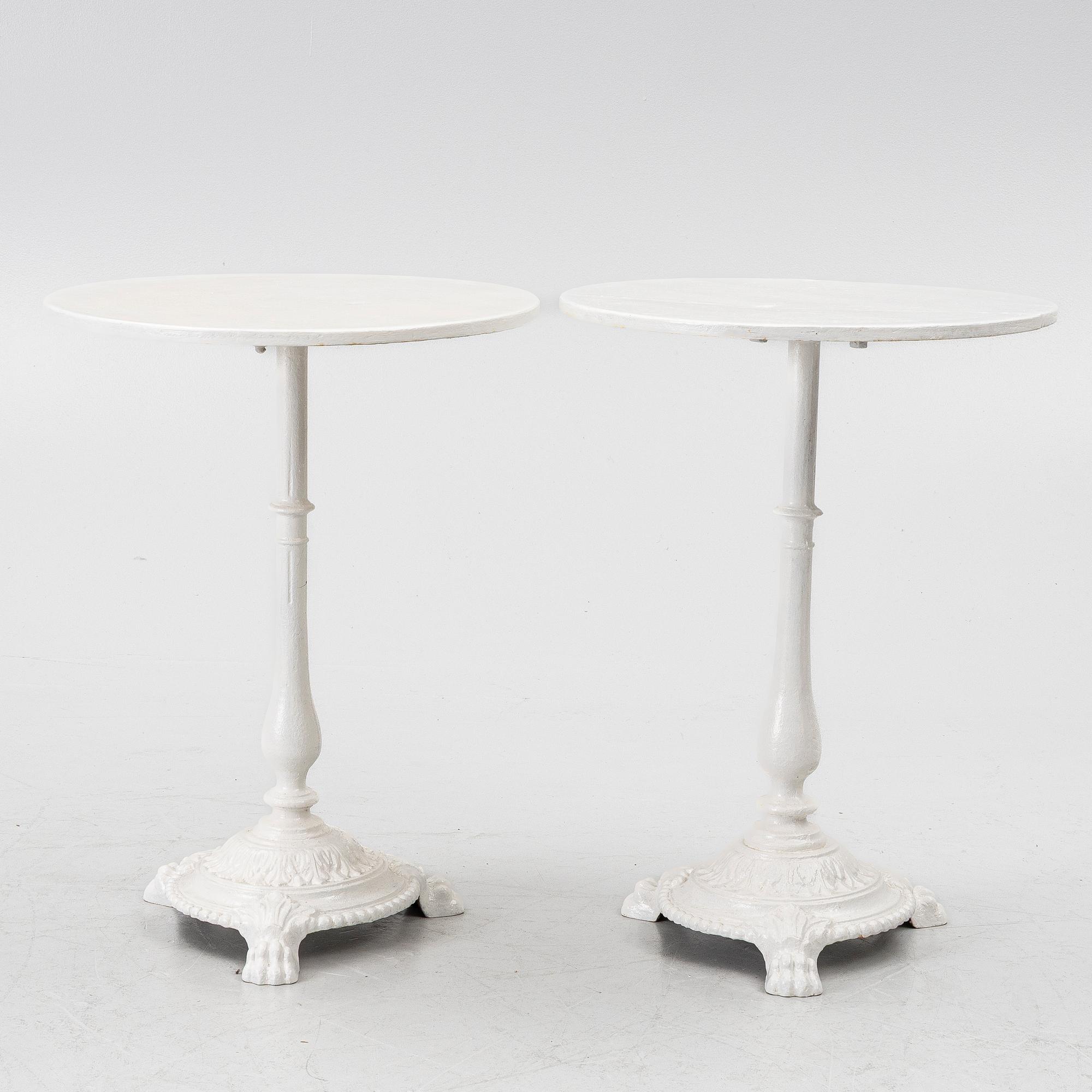 A pair of café tables, around 1900.