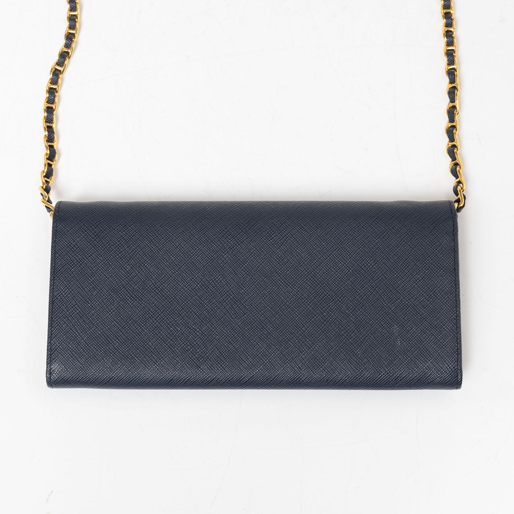 Prada, wallet on chain, 2016.