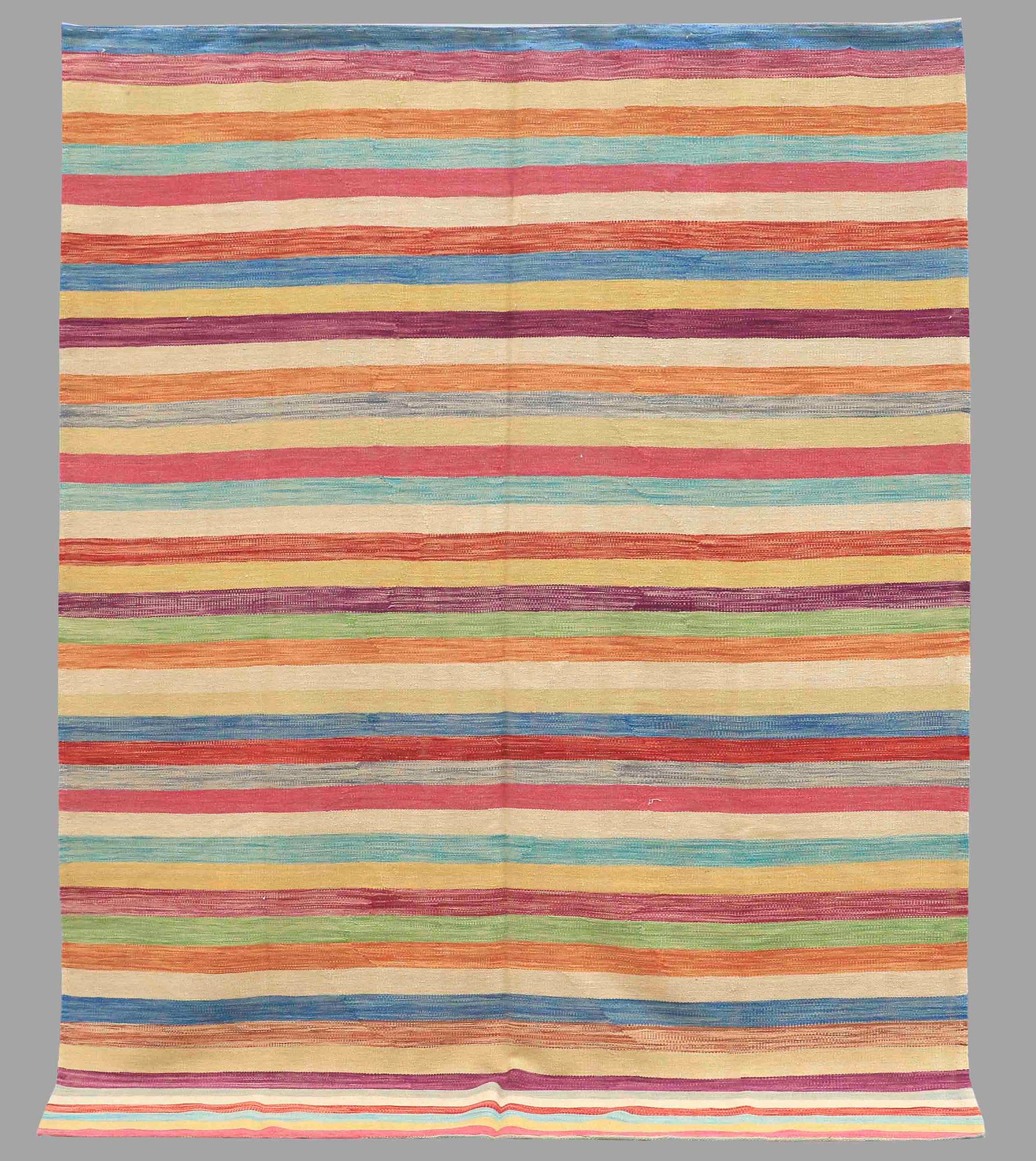 A CARPET, flat weave, around 276 x 203 cm.