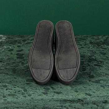 A pair of SNEAKERS by CHANEL, size 39.