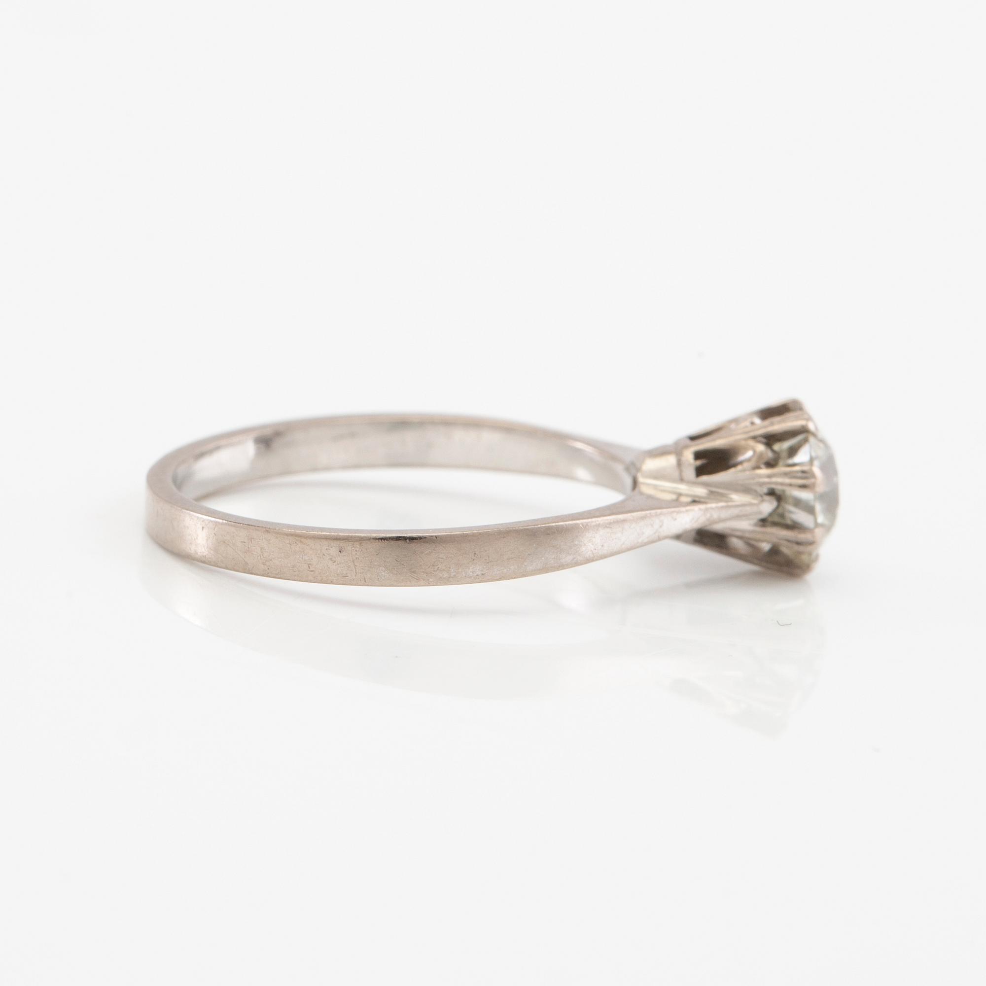 Solitaire ring in 18K white gold with a Very Faint Light Green diamond approximately 1.10 ct.