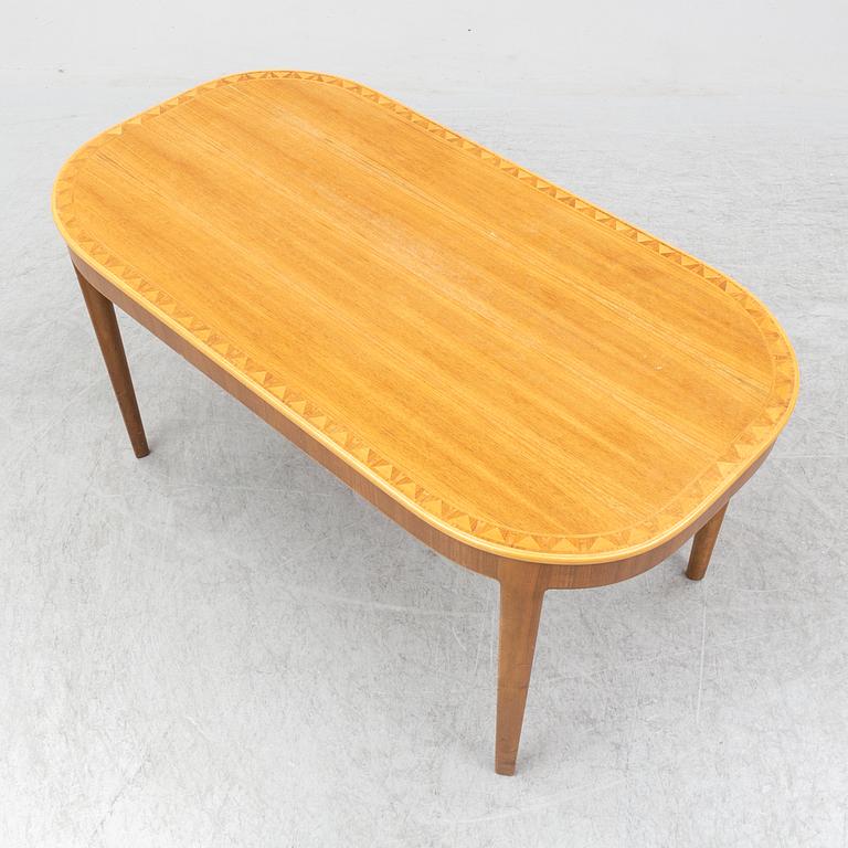 CARL MALMSTEN, a walnut veneered inlay coffee table, probably 1940's.