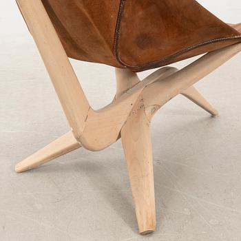 Gösta Westerbergs, a beech and leather easy chair, second half of the 20th Century.