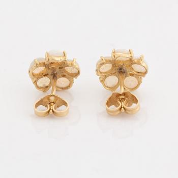 Opal and brilliant cut diamond earrings.