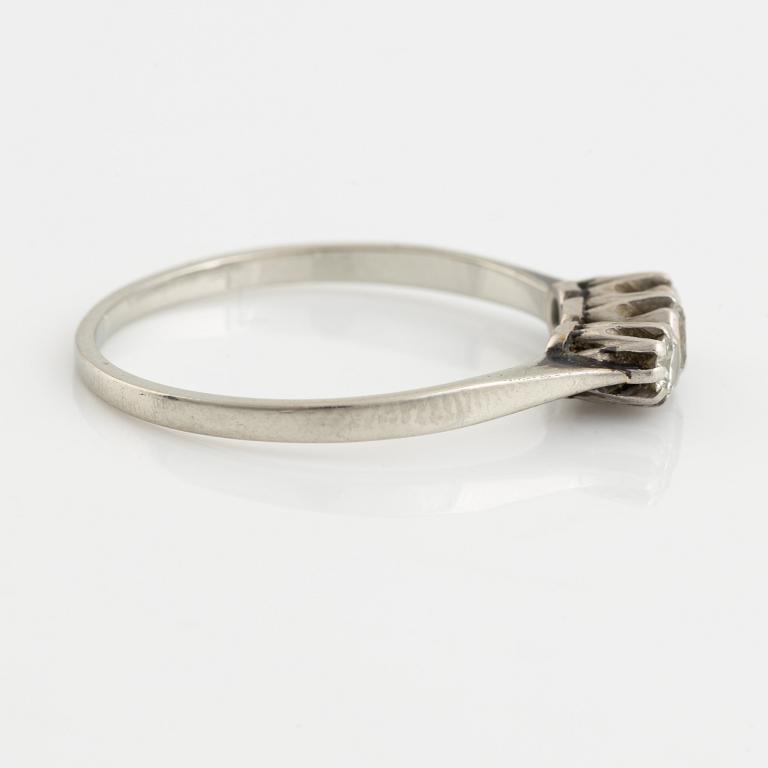 White gold and three brilliant cut diamond ring.