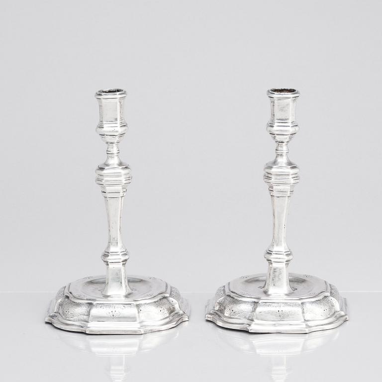 A pair of Swedish early 18th century silver candlesticks, mark of Petter Ersson Lund, Stockholm 1727.