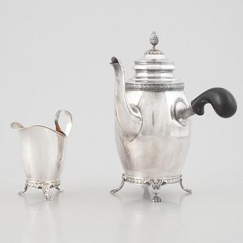 Carl Fredrik Carlman Company, a Gustavian style silver coffee pot and creamer, Stockholm, Sweden, 1915.