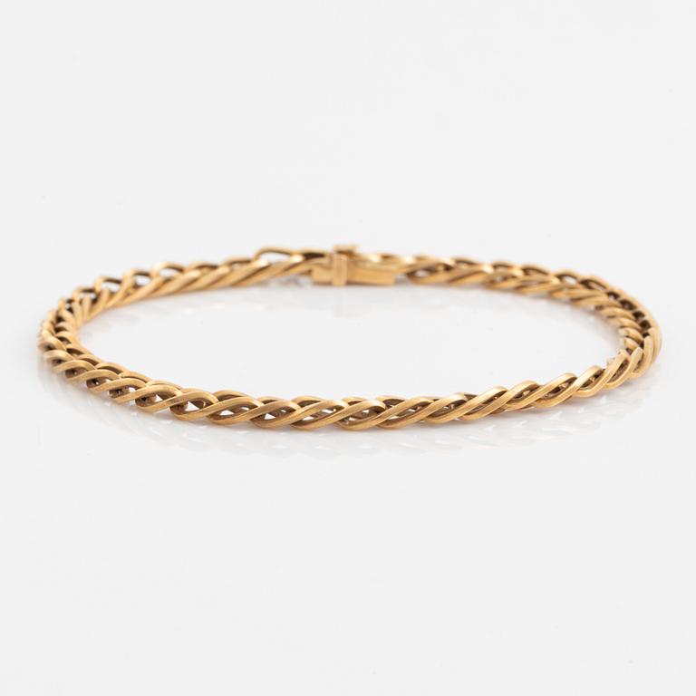 Gold bracelet.