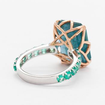 A 14K gold ring with emeralds. IGI certificate.