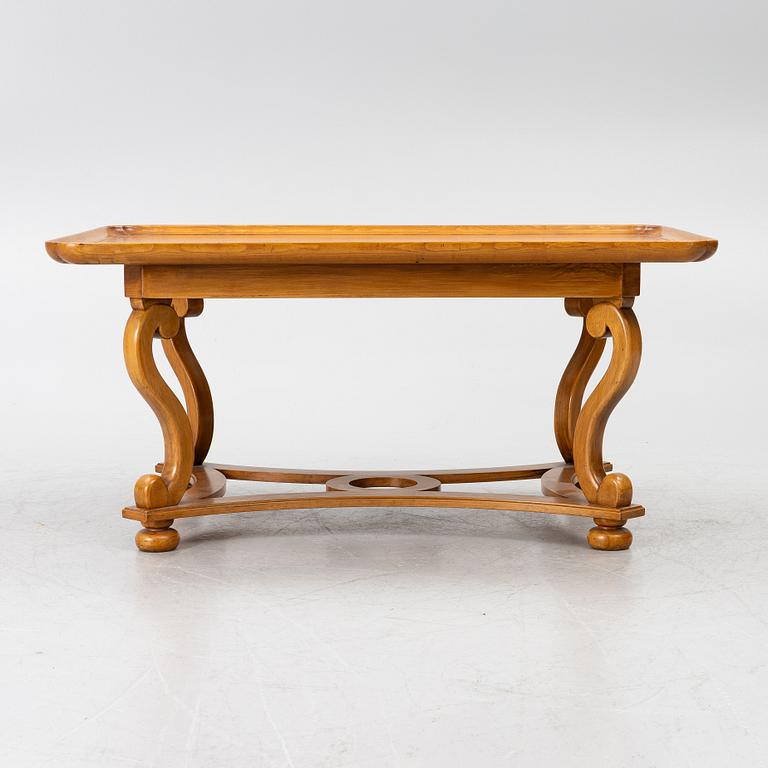 Coffee table, 20th century, with linked legs.