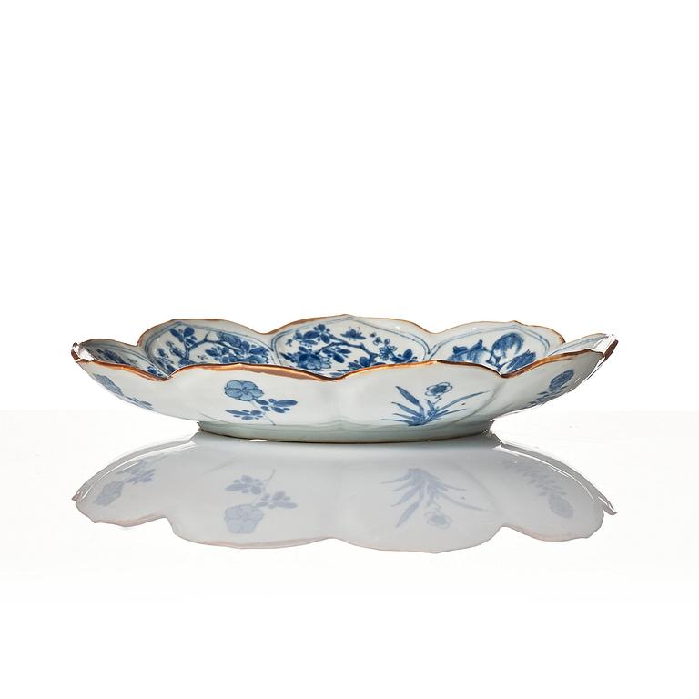 A blue and white flower shaped dish, Qing dynasty, first half of the 18th Century.