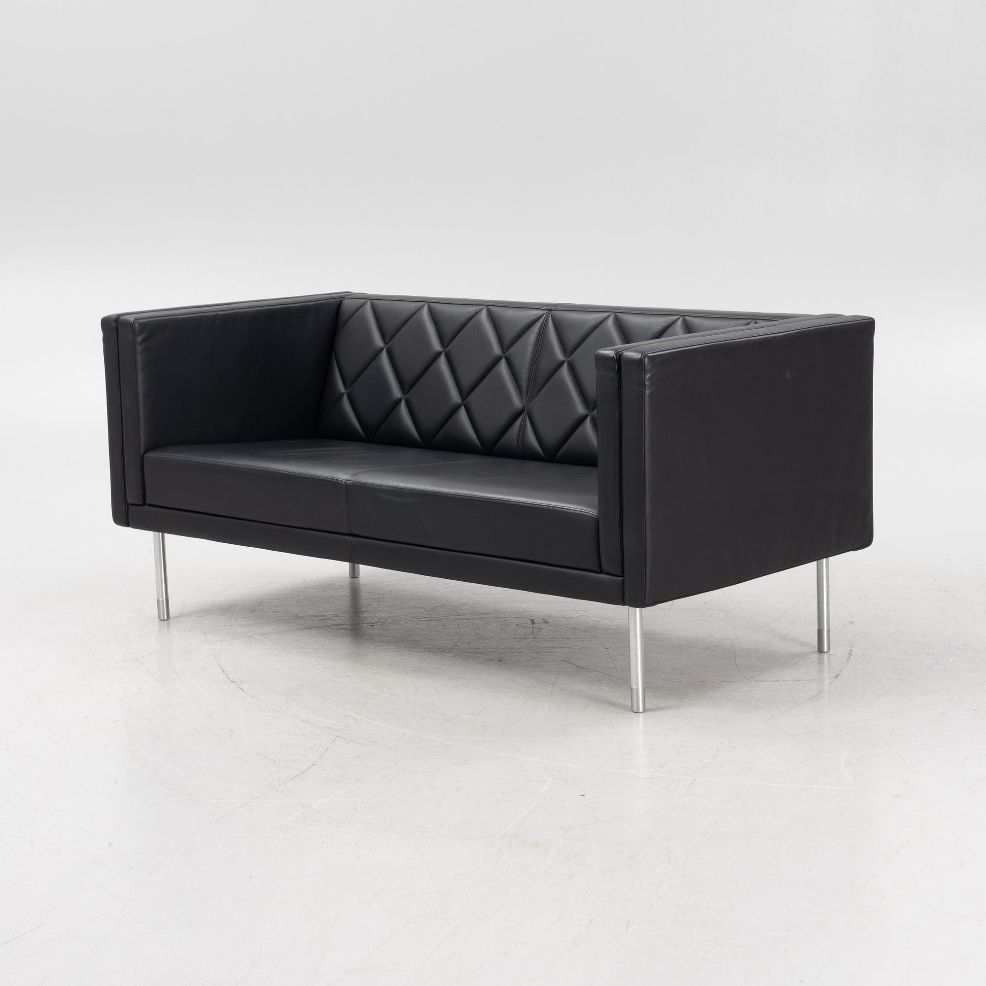 A leather upholstered sofa, 21st Century.