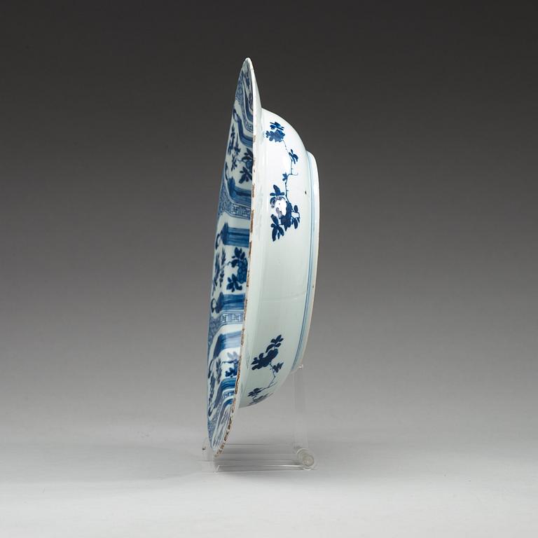 A blue and white dish, Qing dynasty, with Kangxis six character mark and period (1662-1722).