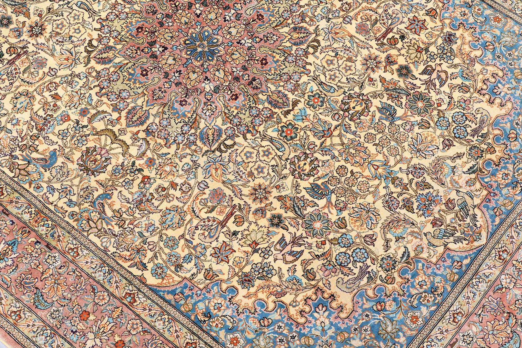 A rug, Figural Oriental silk,  signed, ca 175 x 125 cm.