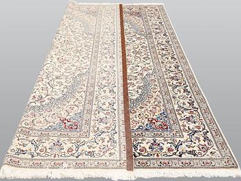 A Nain carpet, part silk, so-called 6LAA, c. 298 x 195 cm.