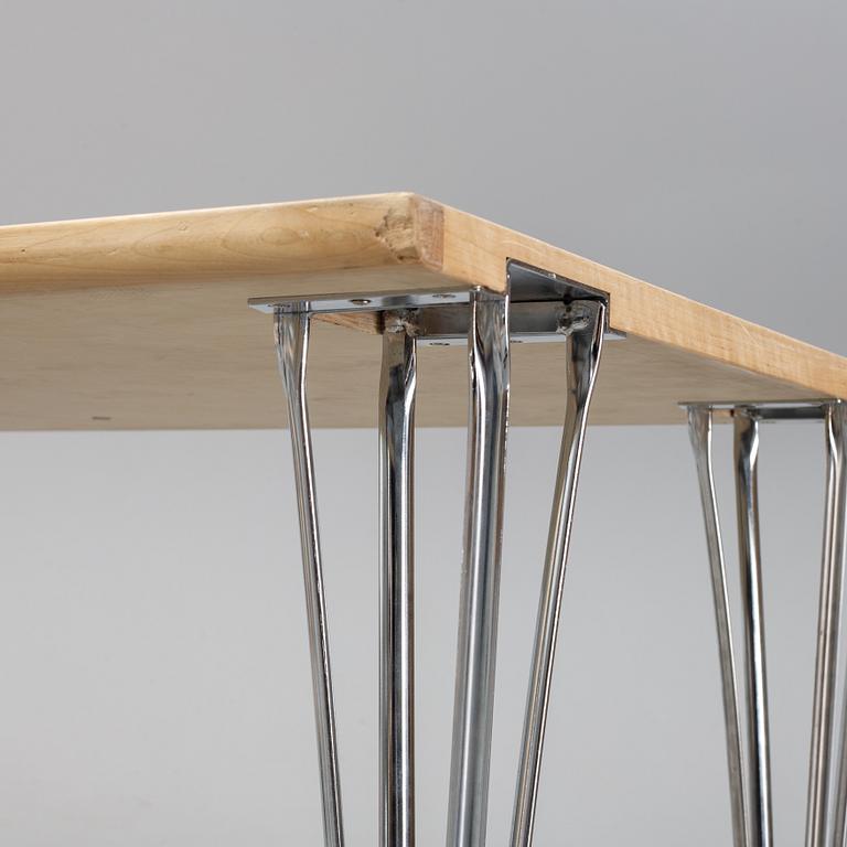 A birch and leather dining table produced by Mathsson International, 21th century.