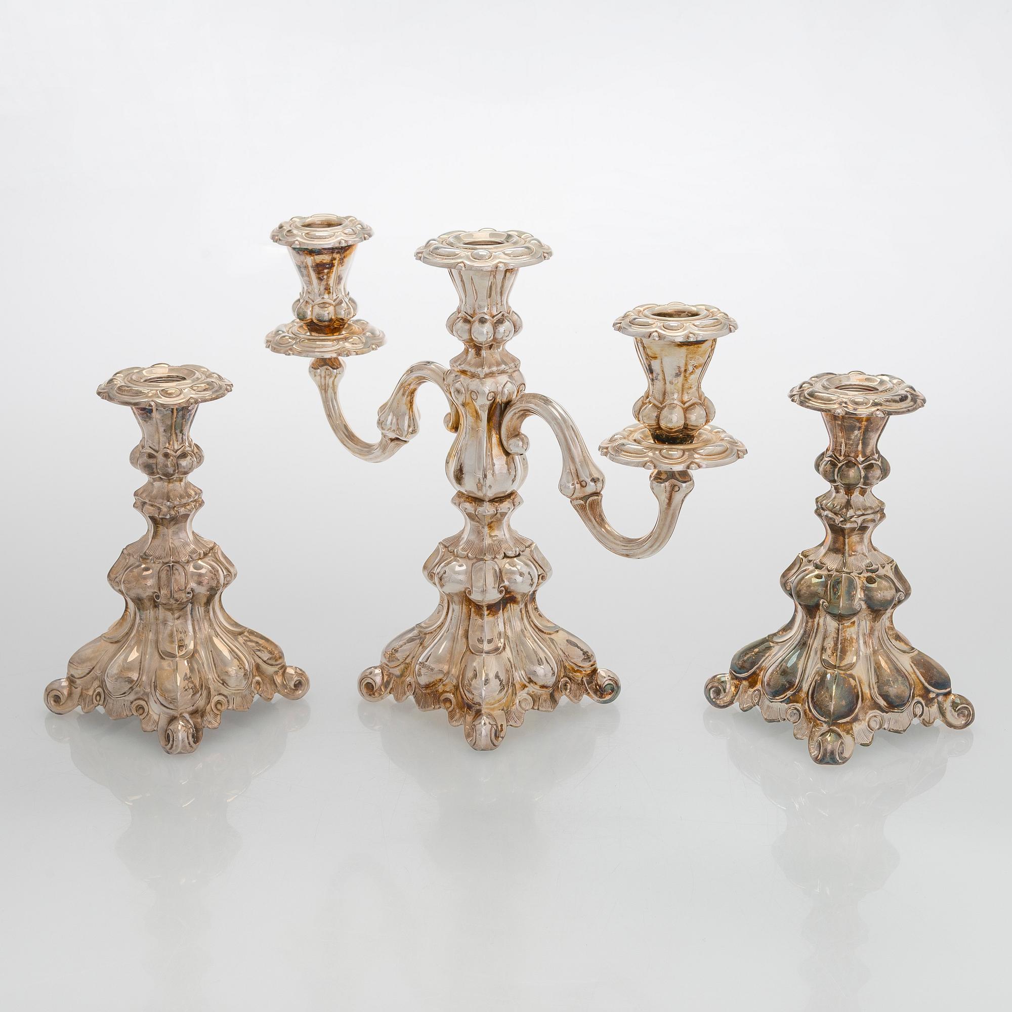 A silver candelabra and a pair of silver candlestick, Kultakeskus Hämeenlinna 1962 and 1985.