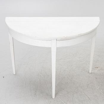 A pair of moon tables, 19th century.