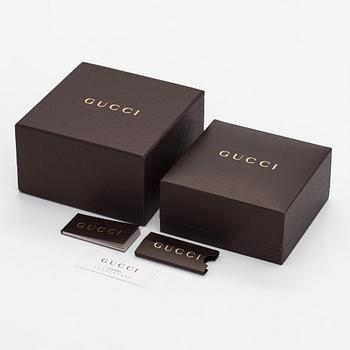 Gucci, an 18K white gold necklace with diamonds.
