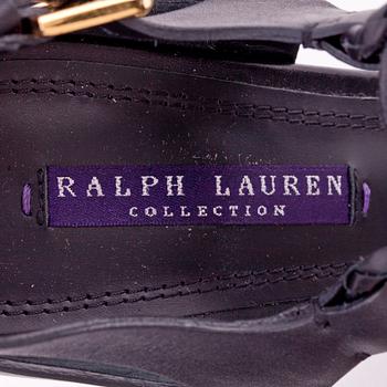 RALPH LAUREN, a pair of black leather sandals. Size US 9.