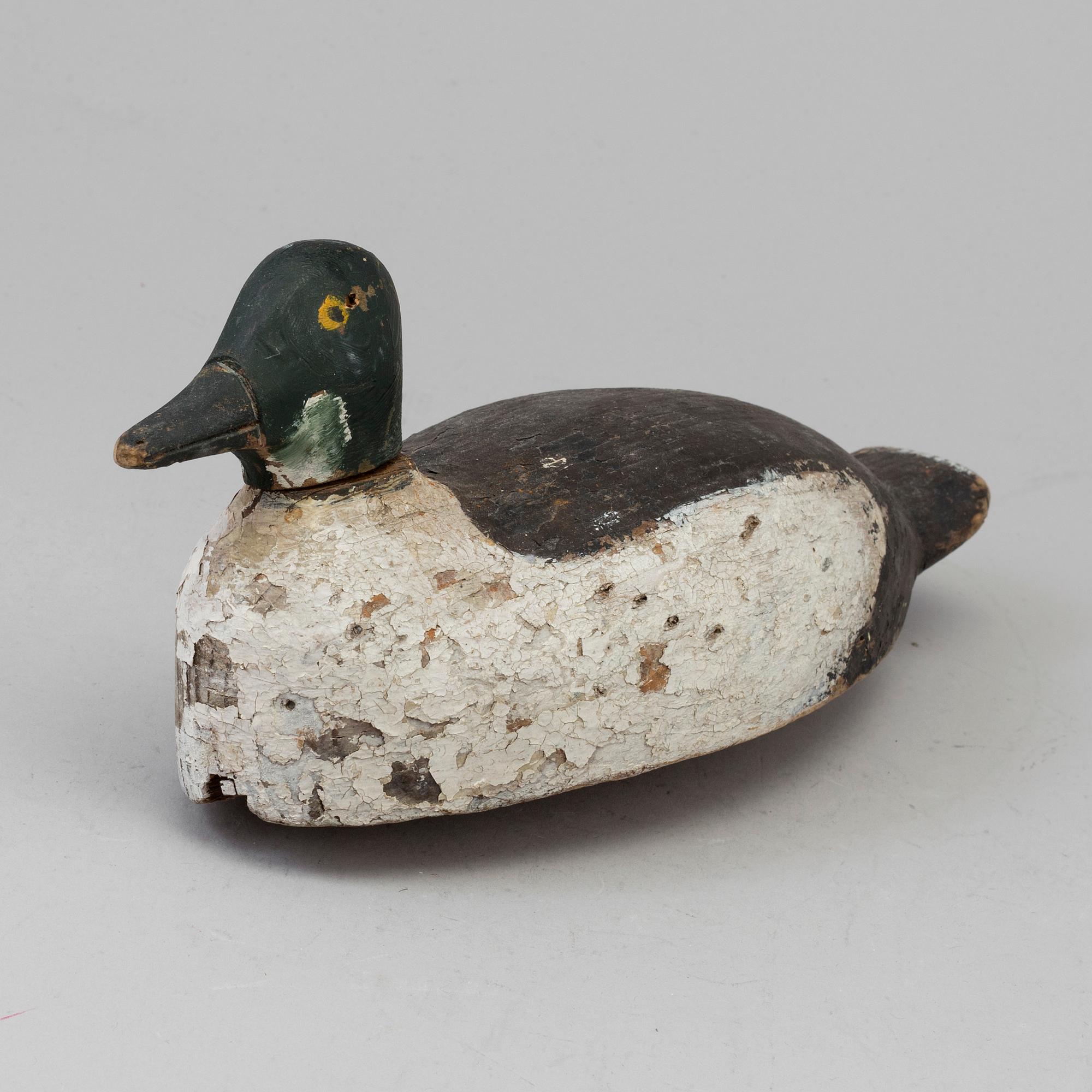 A duck hunt wood decoy circa 1900.