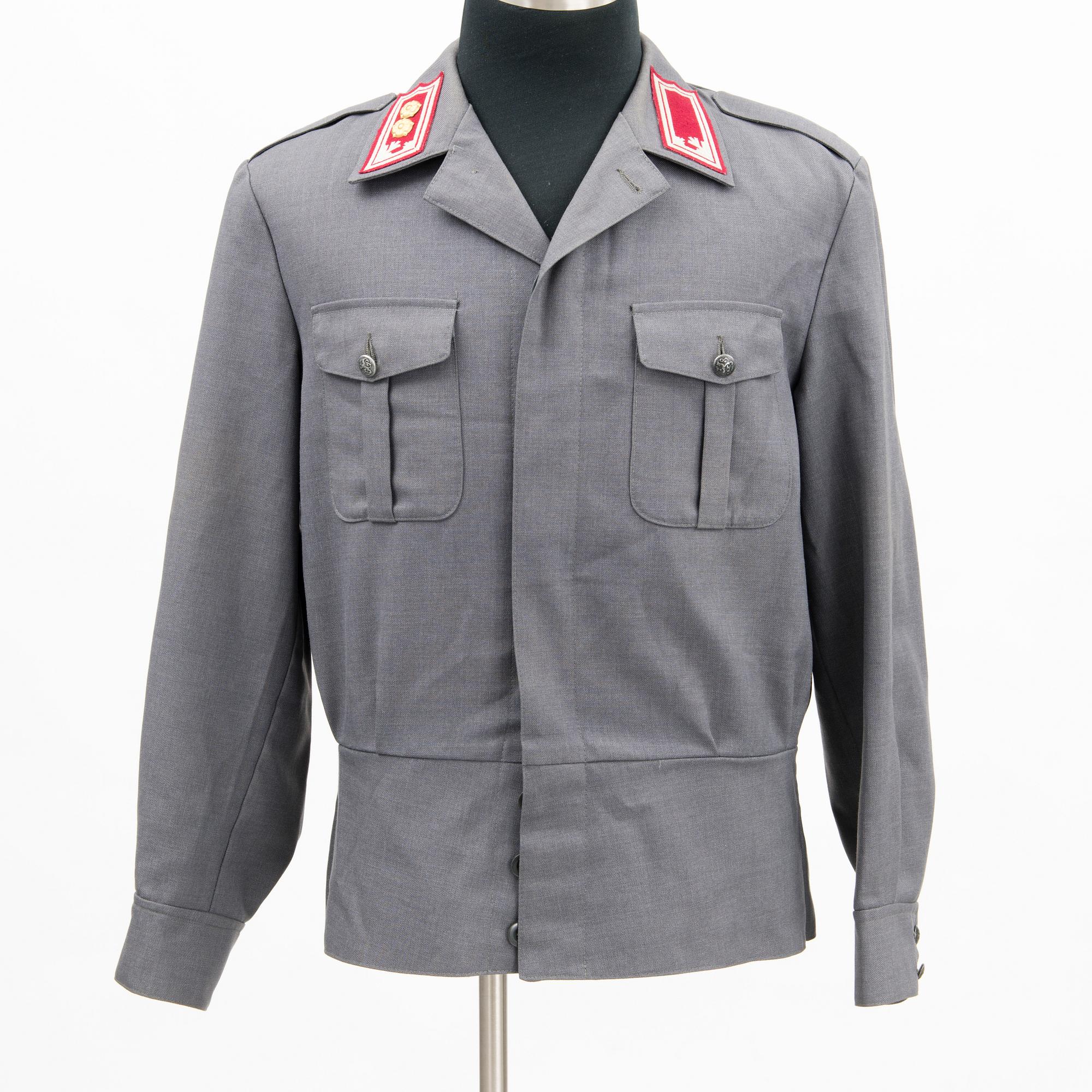 Two Finnish military light uniforms, second half of 20th Century. -  Bukowskis