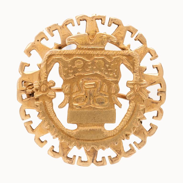 Brosch 18K guld Sydamerika.