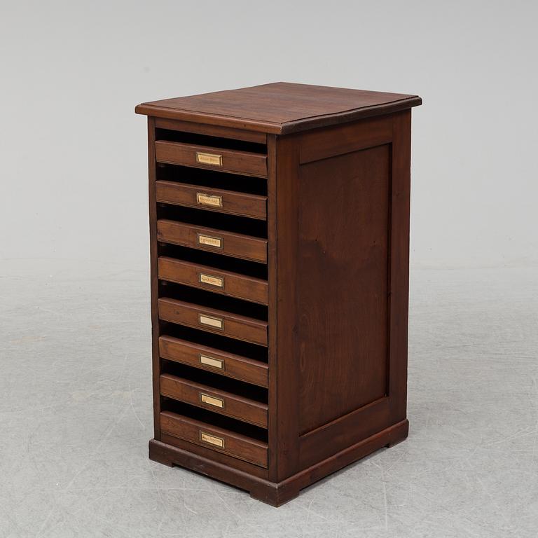 An early 20th Century stained pine office furniture.