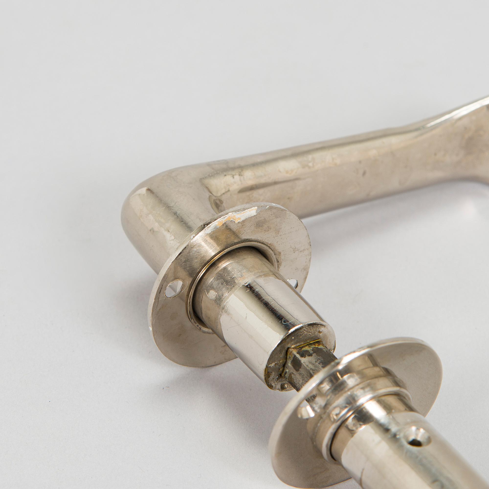 Alvar Aalto, seven paris of mid-20th century doorhandles manufactured by Kellokosken Tehdas, Finland.
