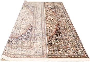 A silk Kashmir carpet, approx. 300 x 200 cm.