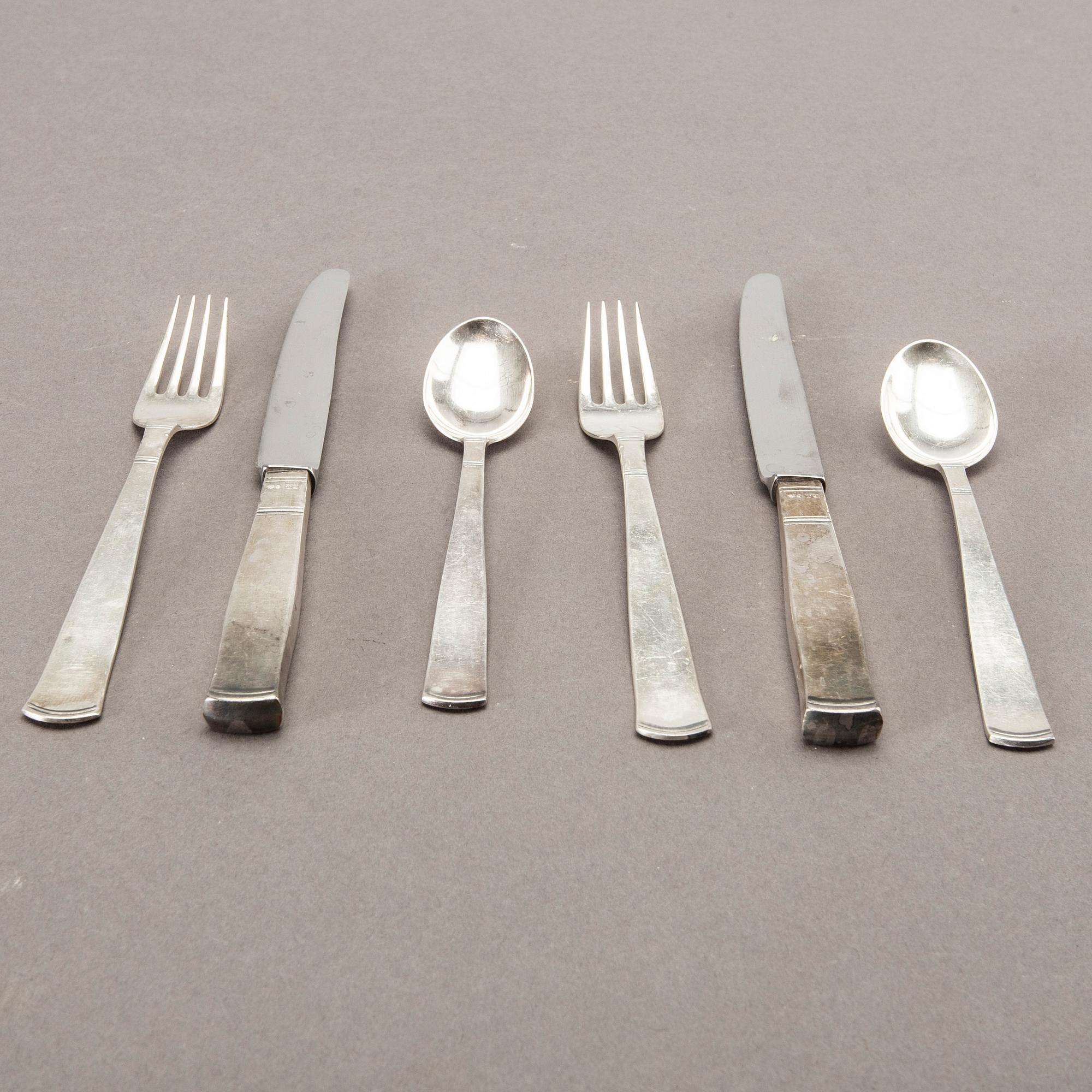 A Swedish 20th set of 36 pcs silver cutlery mark of J Ängman GAB Stockholm 1690/70s, weight ca 980 gr.