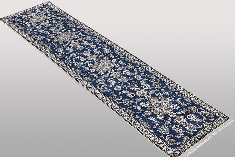 A runner carpet, Nain, part silk, ca 374 x 75 cm.