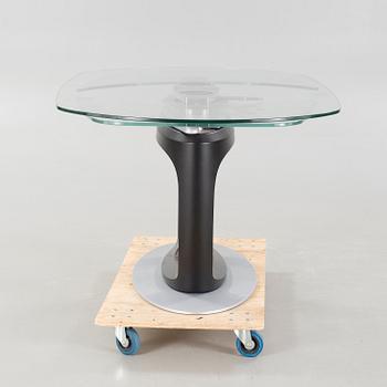 A 21st century "Orbital" dinner table by Pininfarina for Calligaris.