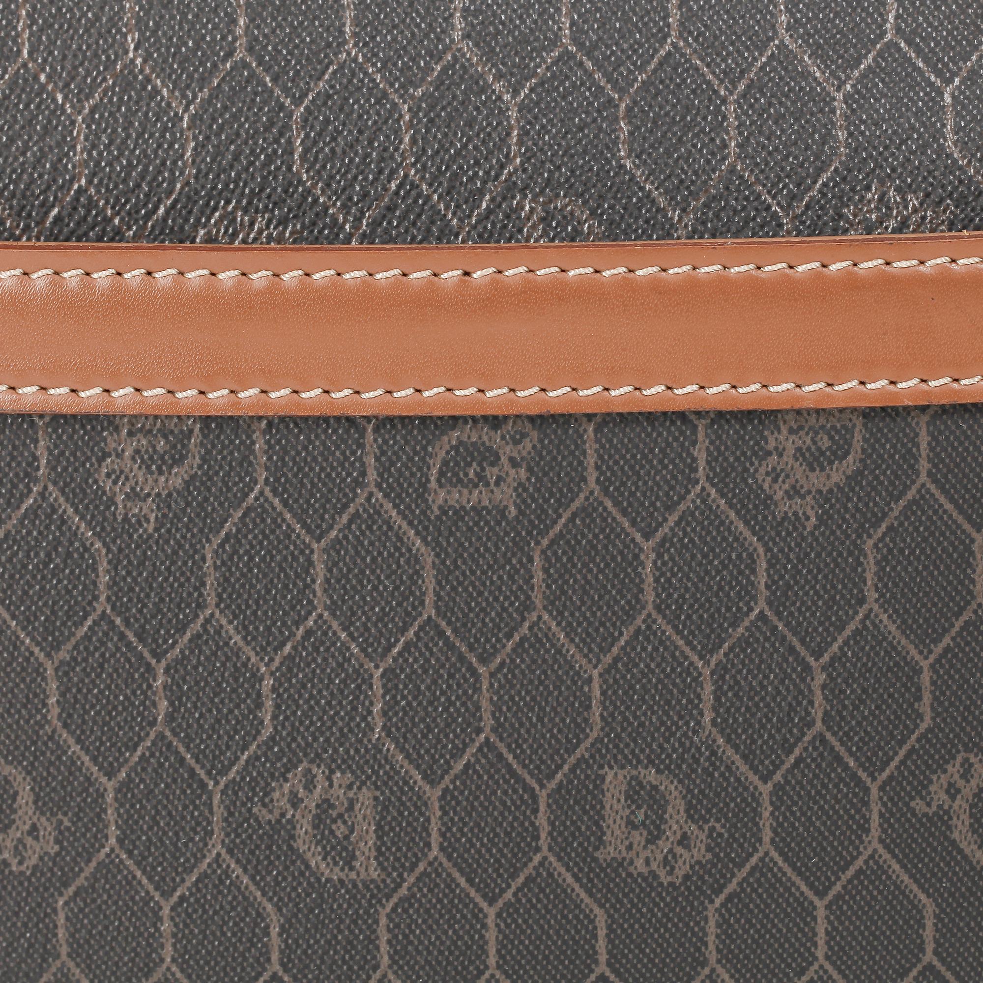 CHRISTIAN DIOR, a brown bag and briefcase.