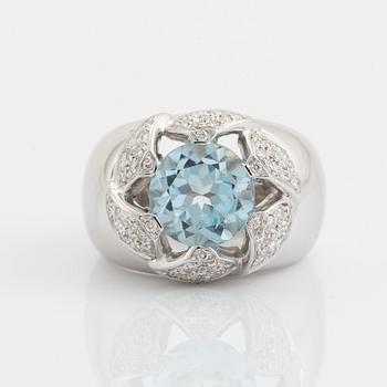 Topaz and brilliant cut diamond ring.