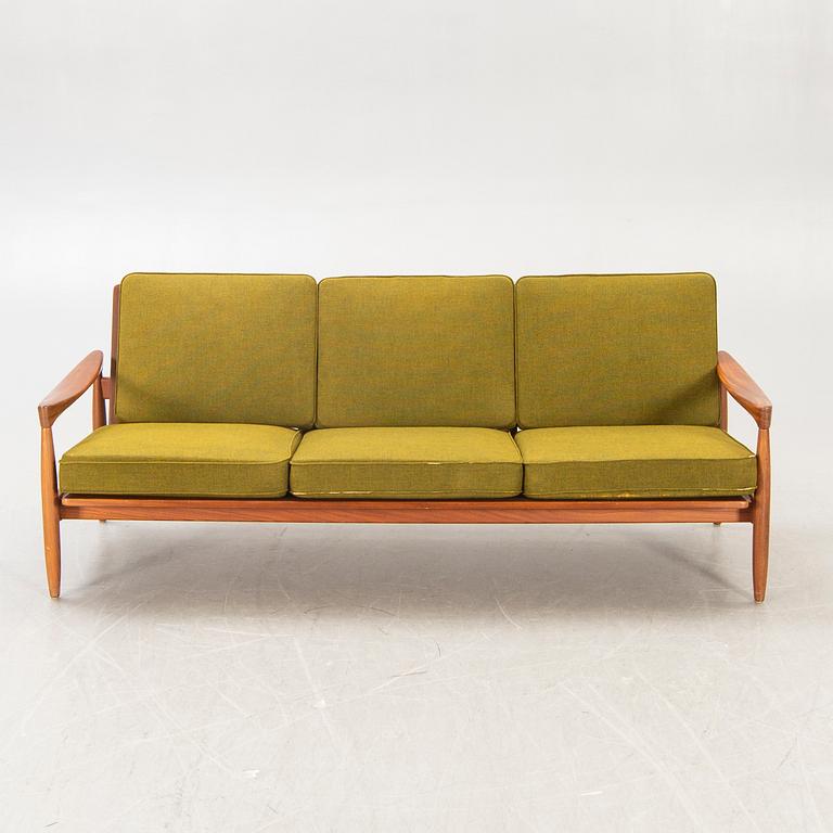 An Erik Wörtz 1962 walnut Kolding sofa for IKEA.