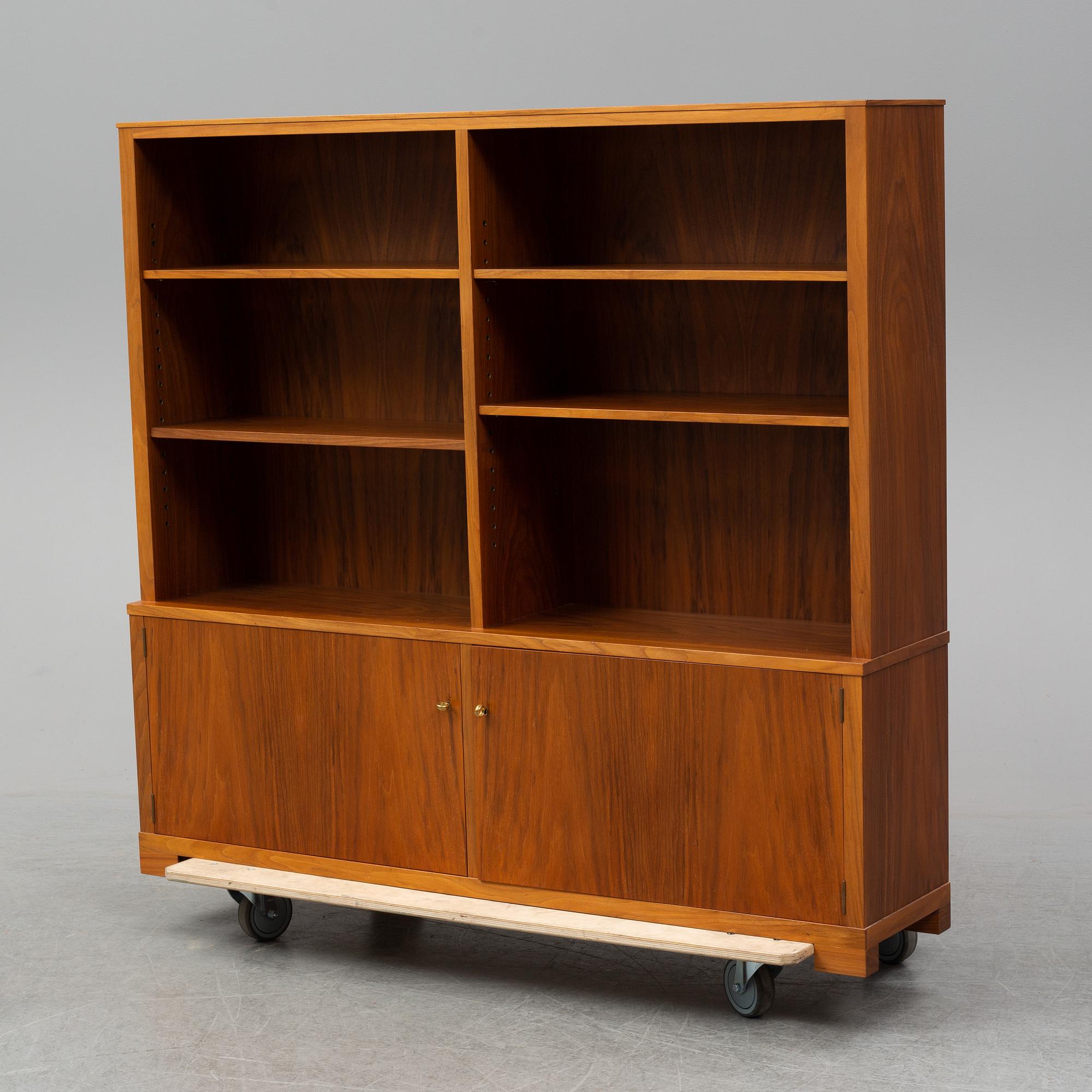 CARL MALMSTEN, a mahogany bookshelf.