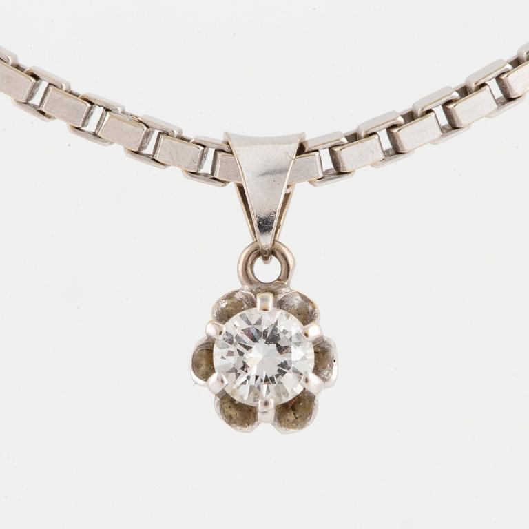 A solitaire brilliant-cut diamond pendant.