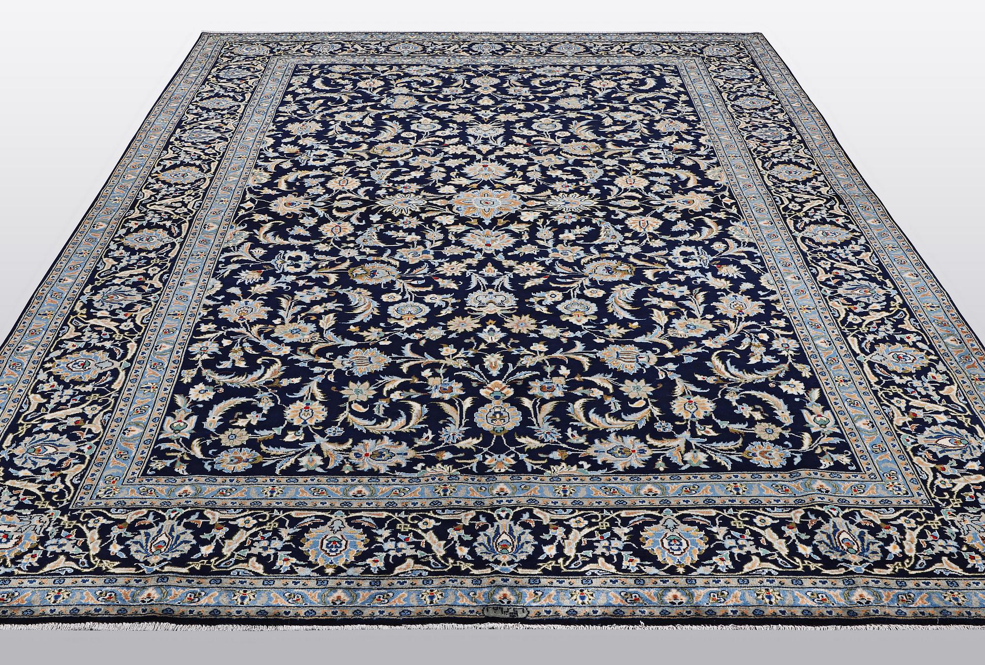 A carpat, Kashan signed Reza Torshi, ca 370 x 250 cm.