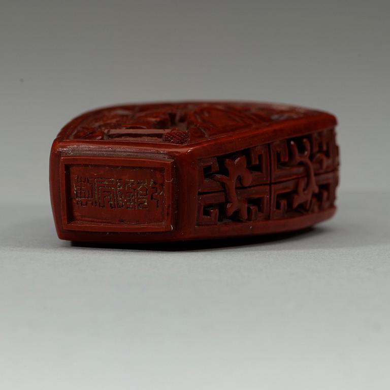 A cinnabar lacquer and bronze snuff bottle, Qing dynasty, and with Qianlong four character-mark, 19th century.