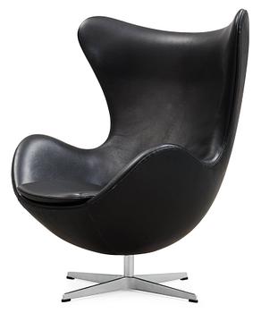 An Arne Jacobsen black leather 'Egg' chair, Fritz Hansen, Denmark 2007.