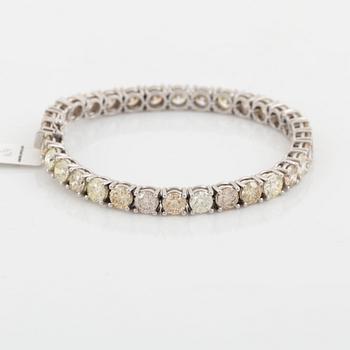 Round brilliant-cut diamond rivière bracelet, with IGI report.