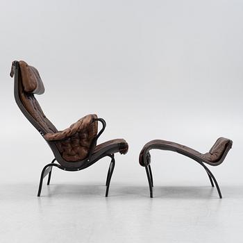 Bruno Mathsson, a 'Pernilla' armchair with ottoman, Dux, Sweden, second half of the 20th century.