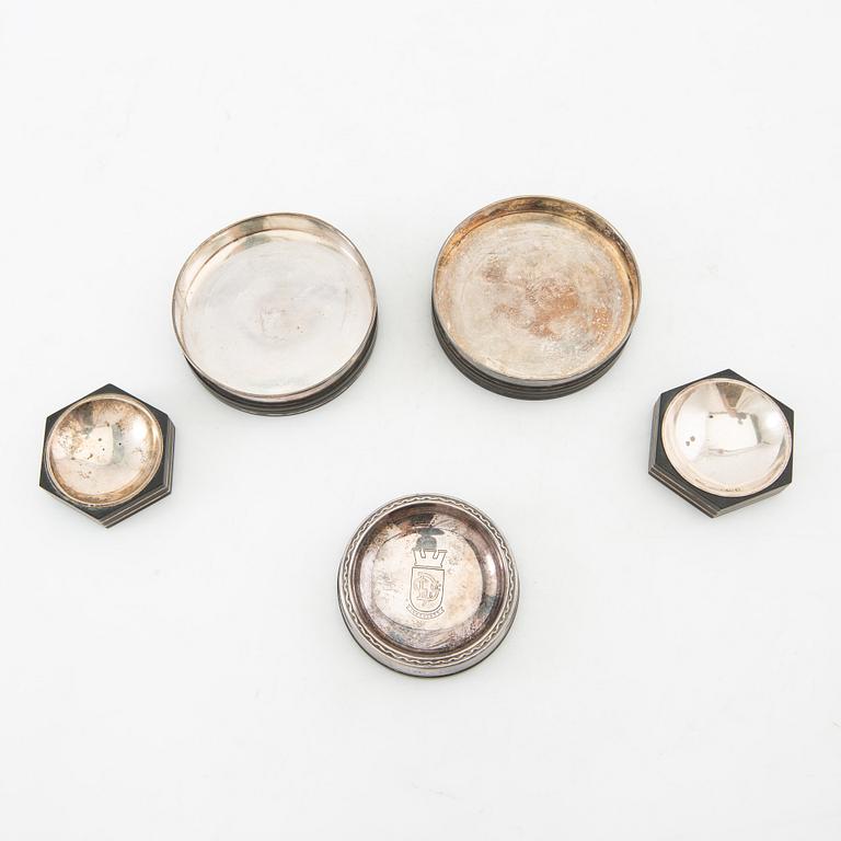 Salt cellars 1 pair and bottle coasters 3 pcs GAB Stockholm 1937, 1938 and 1955 silver and bakelite.