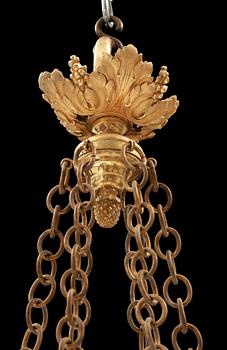 A Louis XVI-style 19th century six-light gilt bronze hanging-lamp.