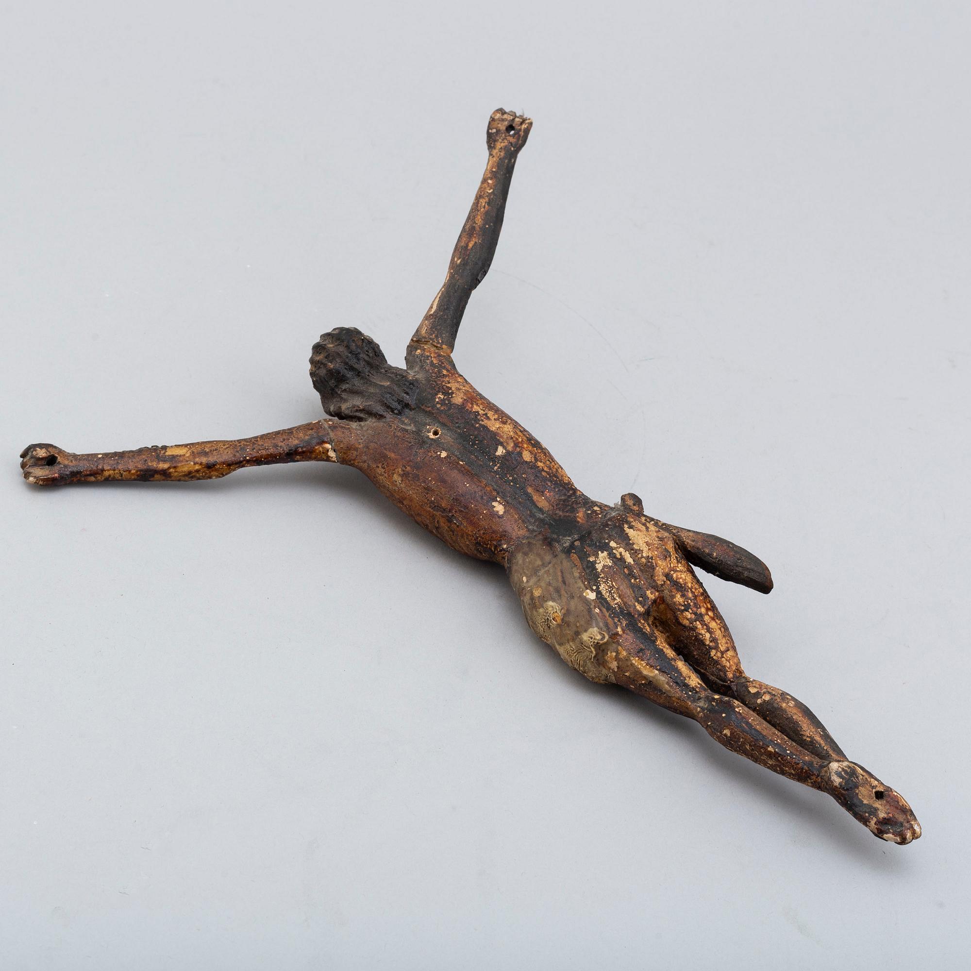 A 17th/18th century wooden crucifix.