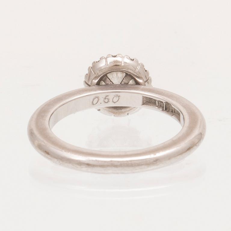 An 18K white gold ring with round brilliant cut diamonds by Engelbert, with GIA dossier.